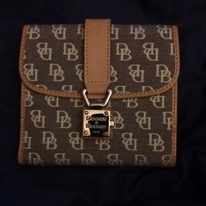 Dooney and Bourke beige wallet.